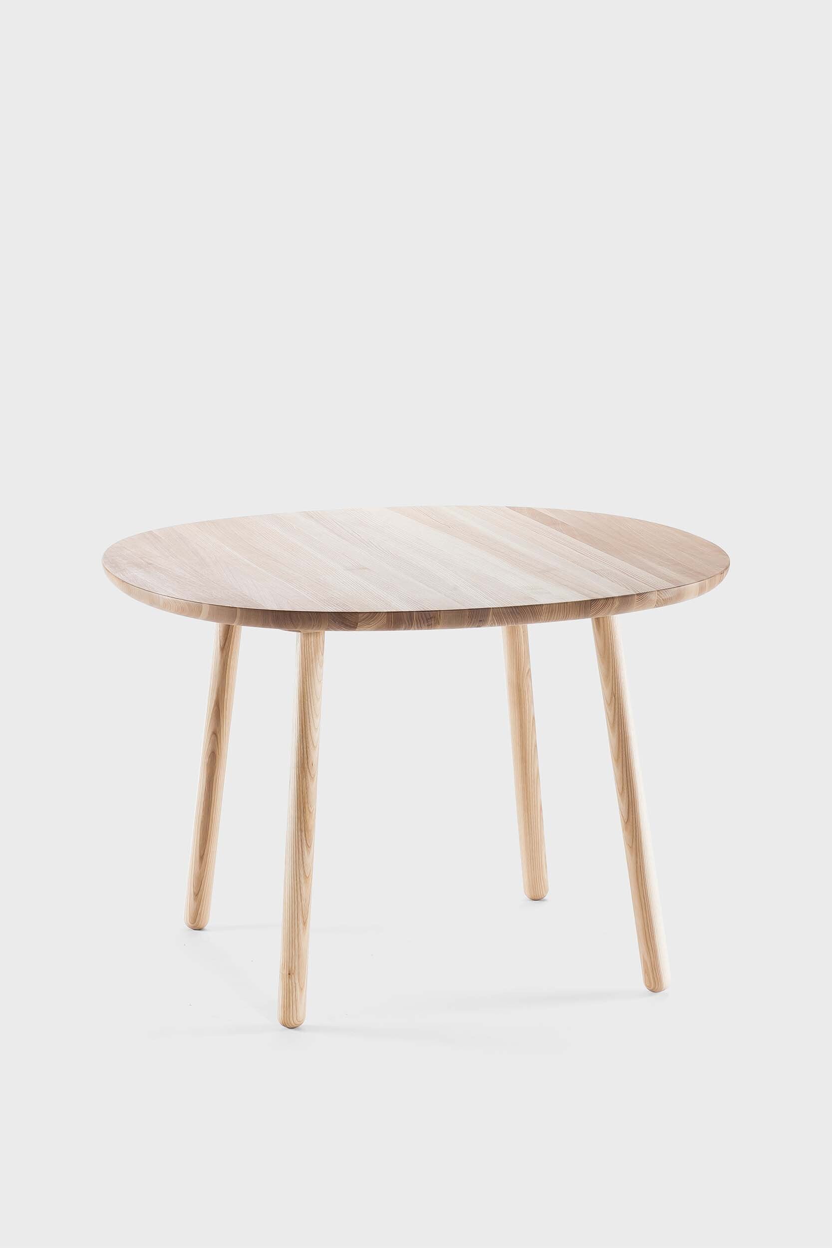 Natural wooden Naïve dining table by Aquamarine Poppy, showcasing a sleek, modern furniture design with a smooth finish.