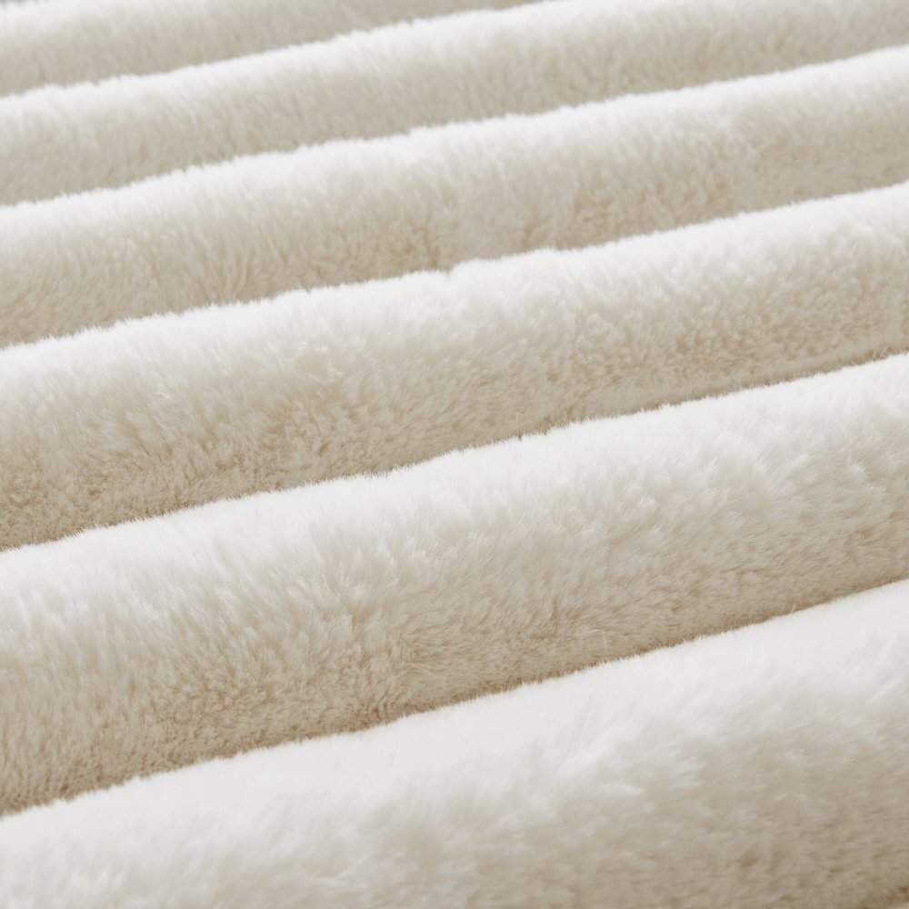 Jasmine Ultrasoft faux fur ribbed comforter set in ivory by Start2Finish, showing the plush, textured bedding on a neatly made bed.