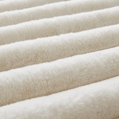 Jasmine Ultrasoft faux fur ribbed comforter set in ivory by Start2Finish, showing the plush, textured bedding on a neatly made bed.
