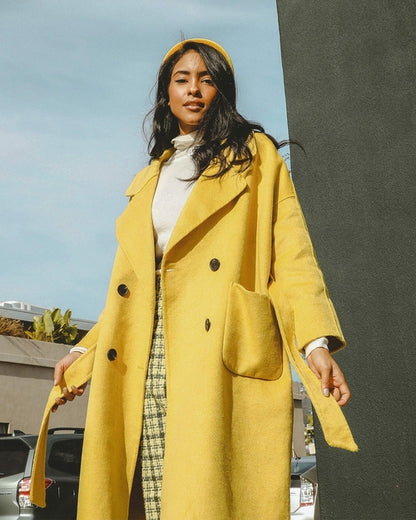 Azure Thanatos Serena double-breasted trench coat for women, shown in a stylish beige color with classic design and waist belt.