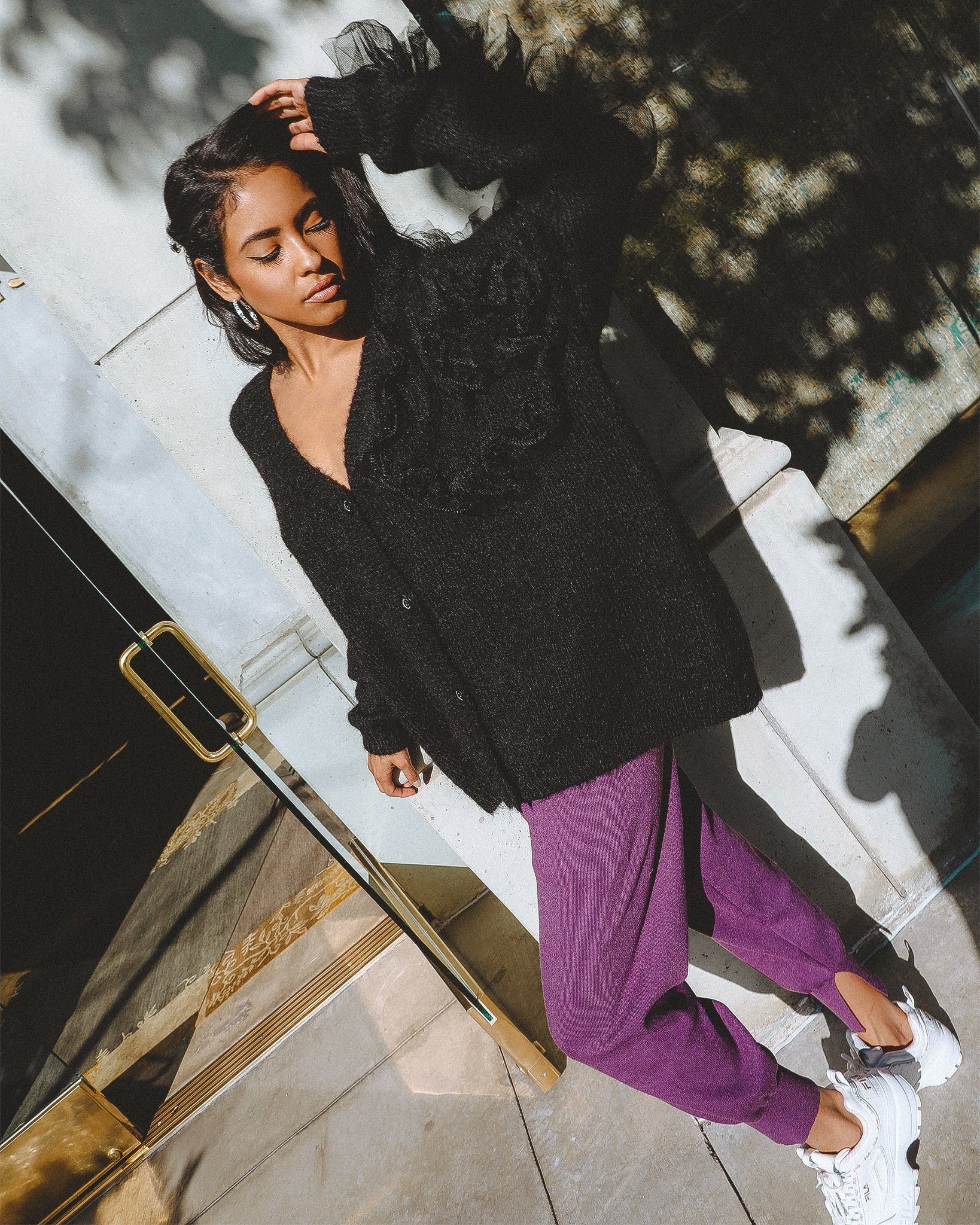 Azure Thanatos Paloma tapered joggers for women, showing fitted cotton pants with elastic waistband and tapered leg design.