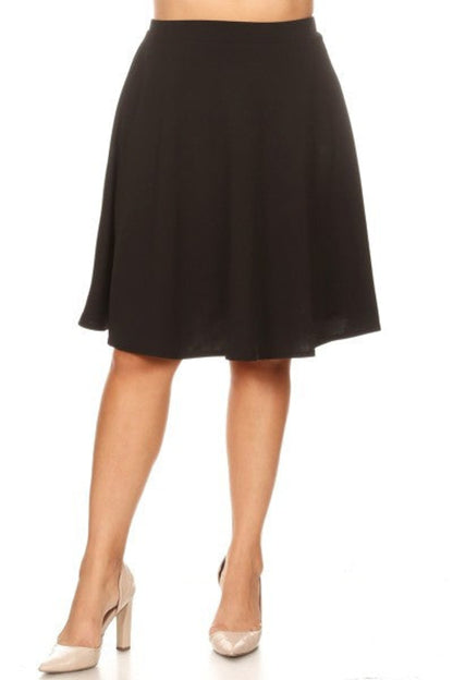 Solid high waisted A-line knee-length skirt for women by Jade Icarus, shown in a natural pose.