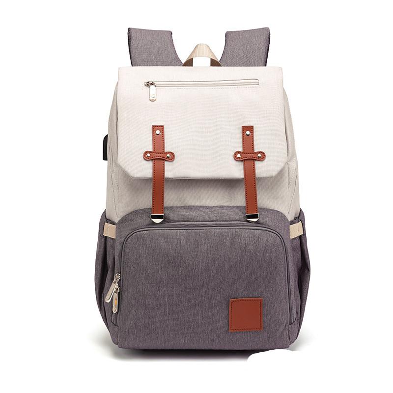 Maroon Asteria Oxford multifunctional mummy backpack with multiple compartments, designed for comfort and durability.