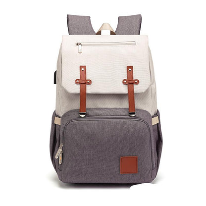 Maroon Asteria Oxford multifunctional mummy backpack with multiple compartments, designed for comfort and durability.
