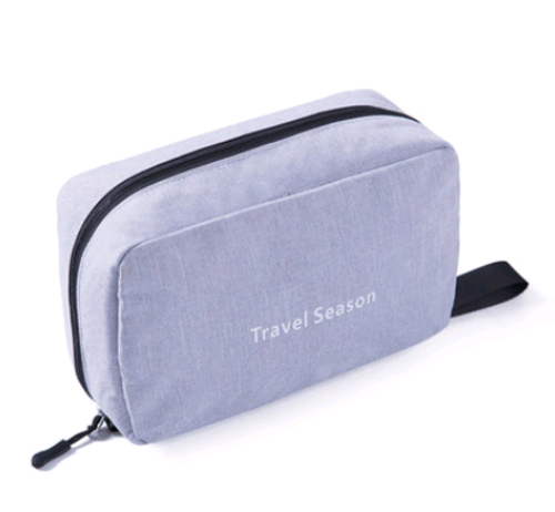 Maroon Asteria portable travel makeup bag with multifunction hooks, compact design, and organized compartments for cosmetics.