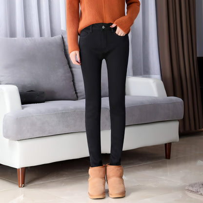 Thick lamb cashmere stretch jeans for women by Carmine Juneberry, showing the fitted denim with a high waist and stylish design.