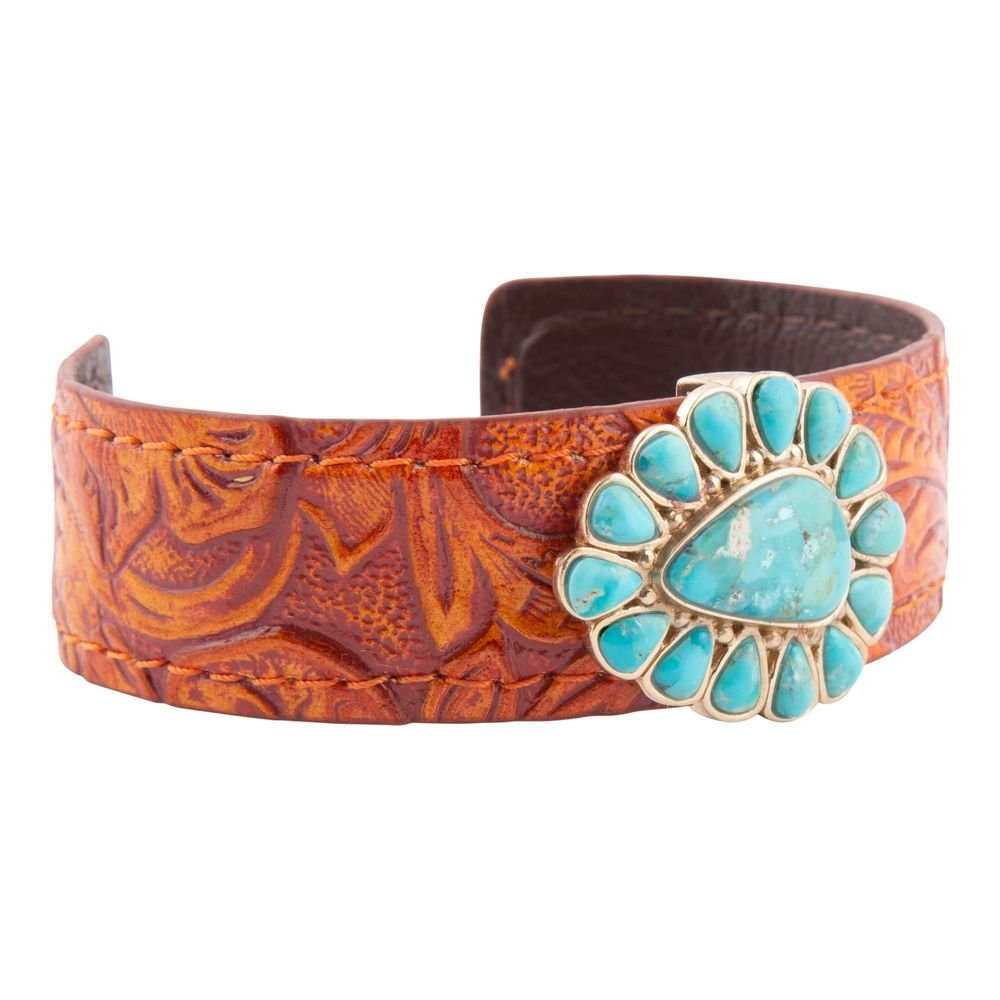 Blue turquoise leather and gold cuff bracelet from Start2Finish jewelry with intricate design and bold style.