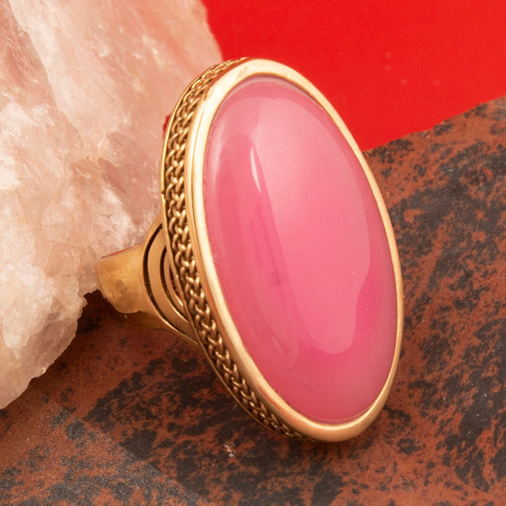 Ovation Pink Jade Golden Statement Ring by Start2Finish featuring a vibrant pink jade stone and gold band jewelry.