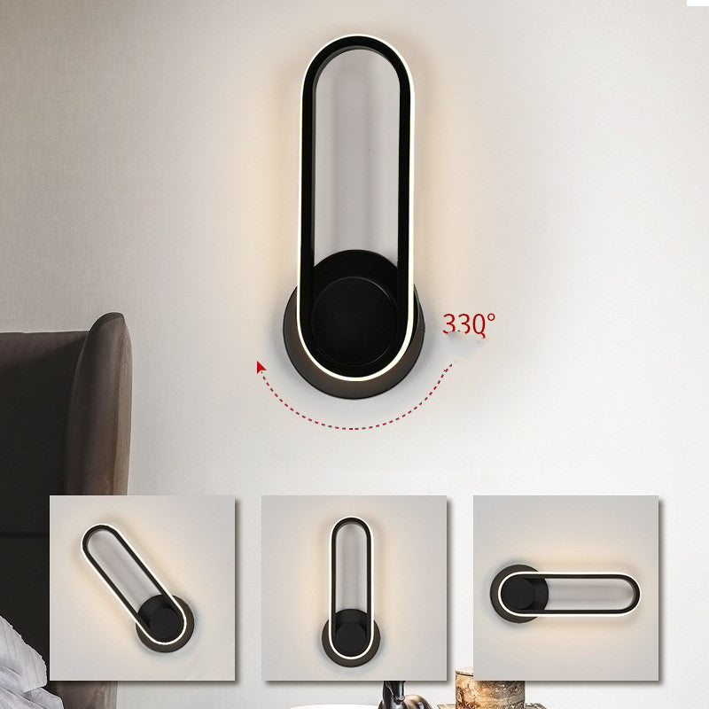 Maroon Asteria indoor rotatable acrylic LED wall lamp for bedroom lighting, featuring modern design and adjustable illumination.