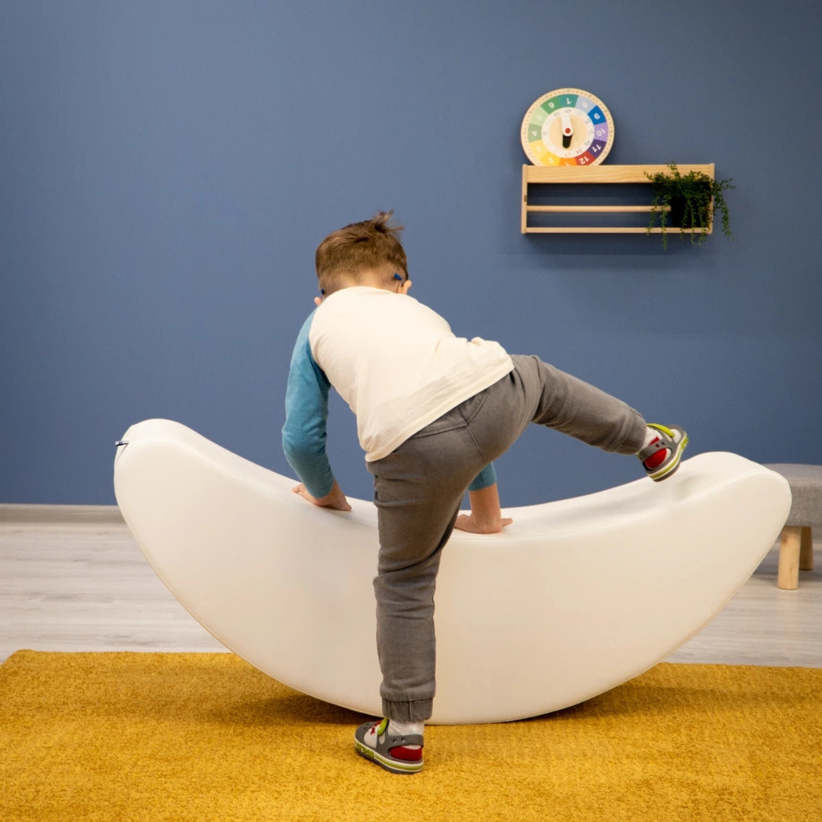 Blush Apricot furniture banana-shaped decorative sculpture on a neutral background, showcasing modern design and bright yellow color.