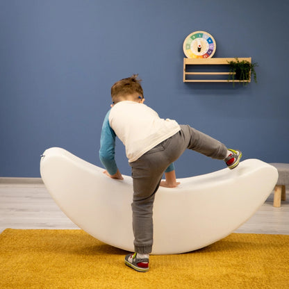 Blush Apricot furniture banana-shaped decorative sculpture on a neutral background, showcasing modern design and bright yellow color.