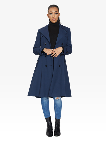 Navy double-breasted trench coat by Rose Eleusis, lightweight spring and summer jacket with classic lapels and belt.