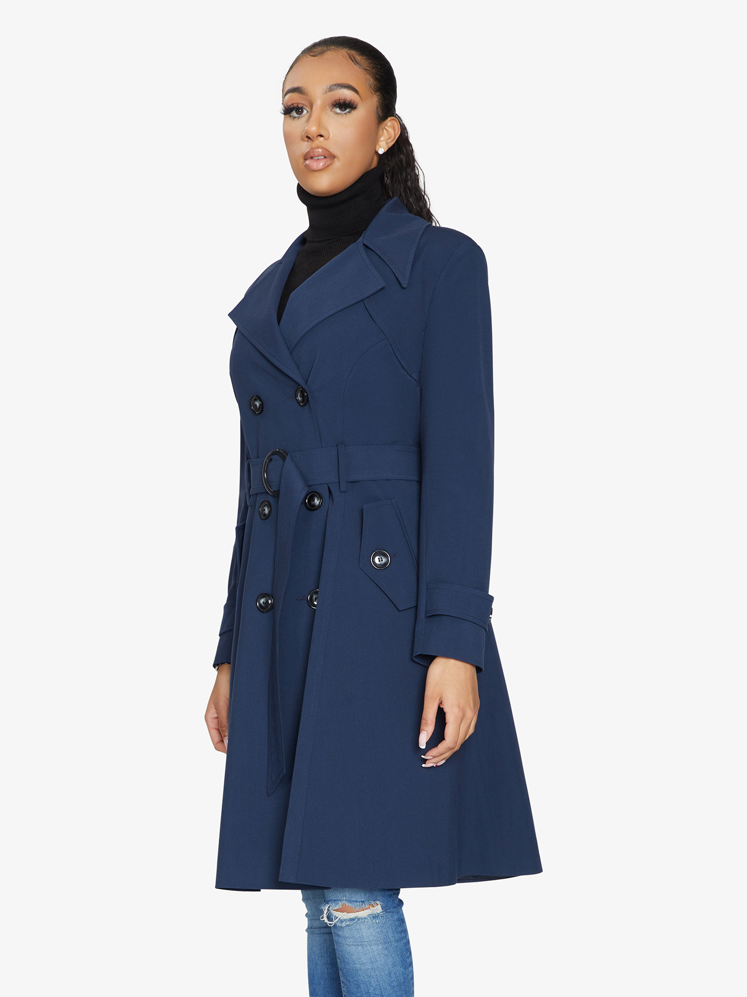 Navy double-breasted trench coat by Rose Eleusis with classic lapels and belted waist, perfect for spring and summer wear.