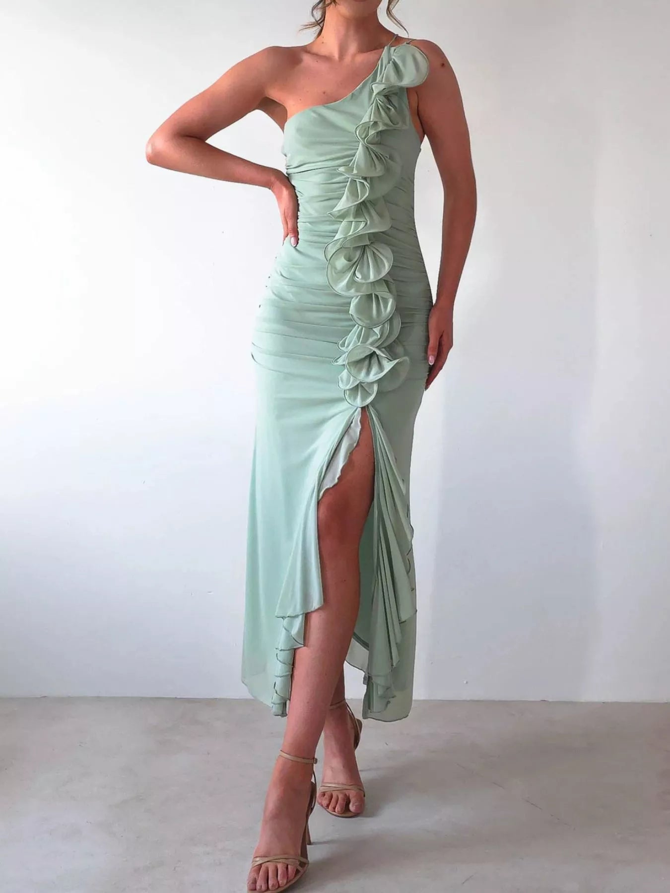 Jade Iapetus stylish one-shoulder ruffle slit dress with flowing fabric and elegant design, ideal for formal or evening wear.
