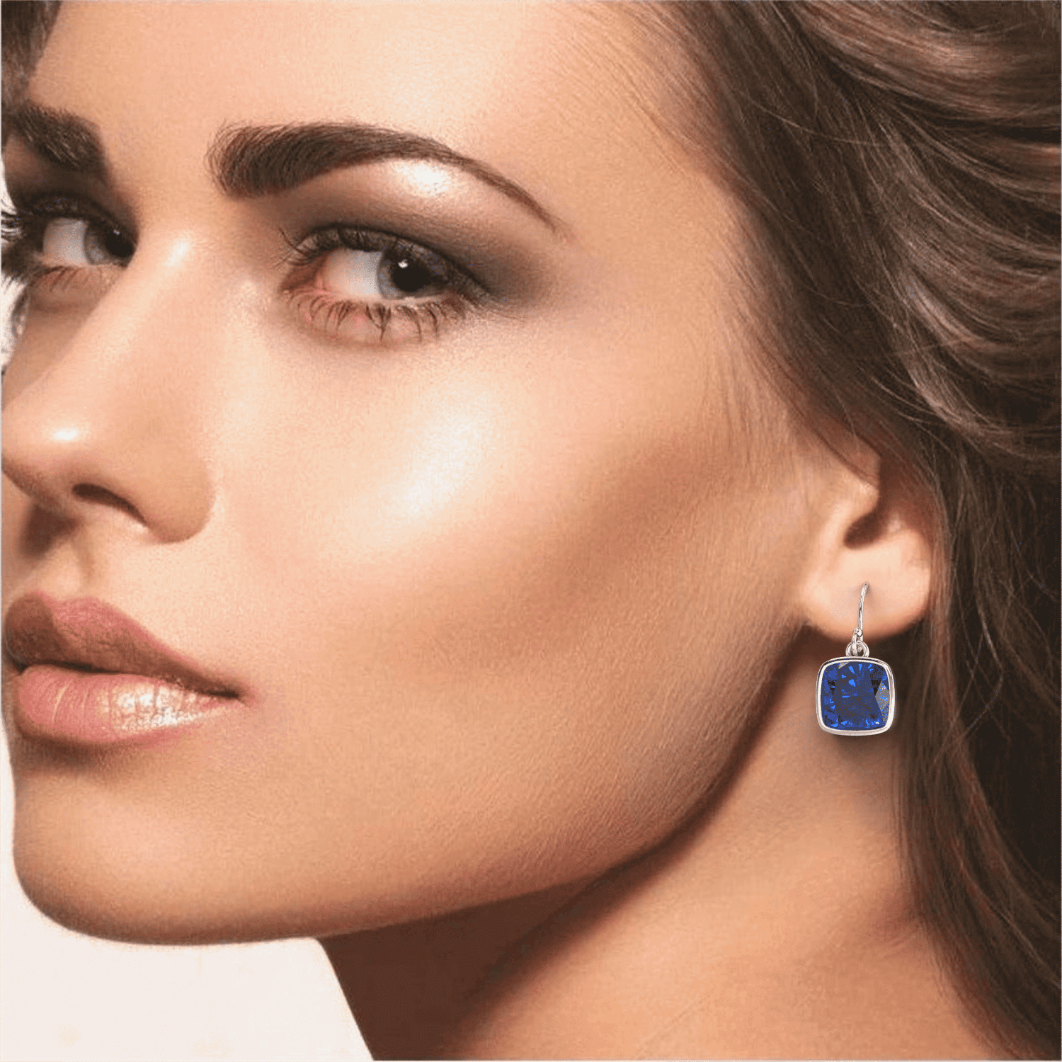 Two pair pack of cushion cut blue sapphire and emerald drop earrings in sterling silver or 14kt gold, featuring 8mm square gemstones.