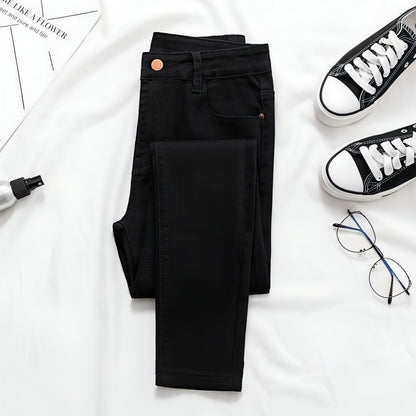 Women’s DenimDare™ skinny plus size jeans by Carmine Juneberry, stylish denim pants with a fitted silhouette.