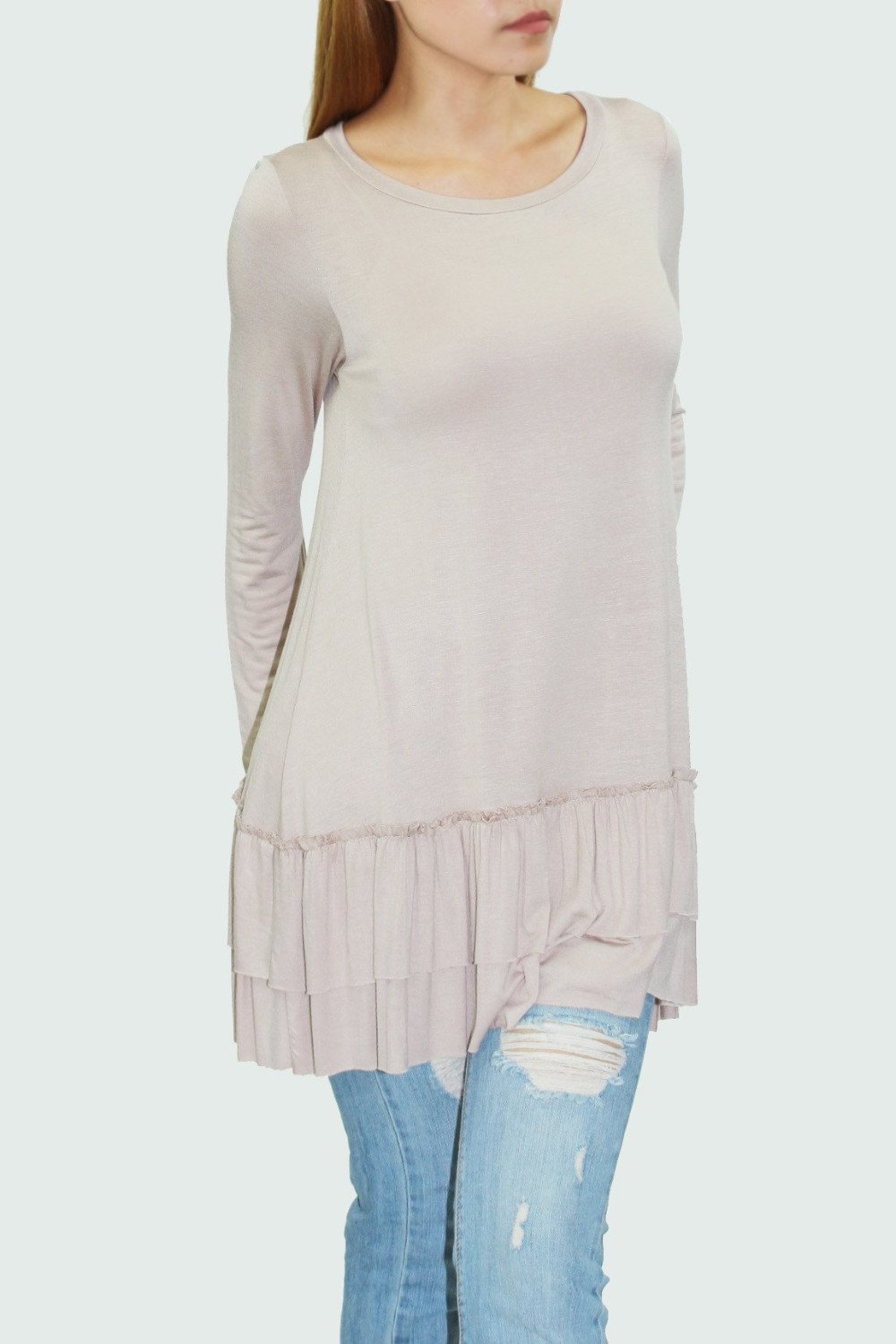Beige ruffle bottom long sleeve tunic by Yellow Hera, casual clothing with feminine ruffle details and comfortable fit.