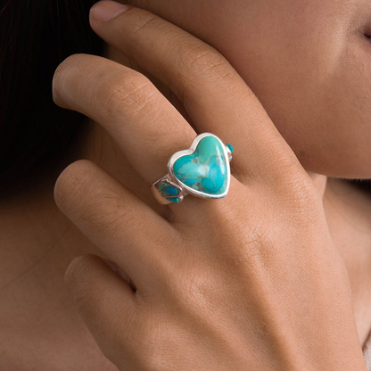 Blue turquoise heart sterling silver statement ring with intricate band, designed for bold jewelry fashion.