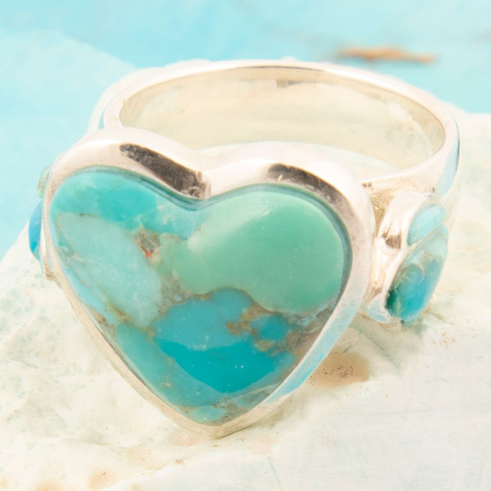 Blue turquoise heart sterling silver statement ring with intricate design, crafted by Start2Finish jewelry.