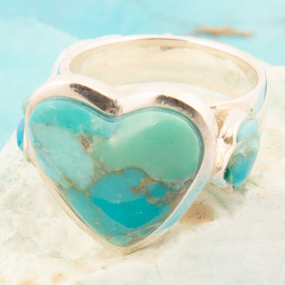 Blue turquoise heart sterling silver statement ring with intricate design, crafted by Start2Finish jewelry.