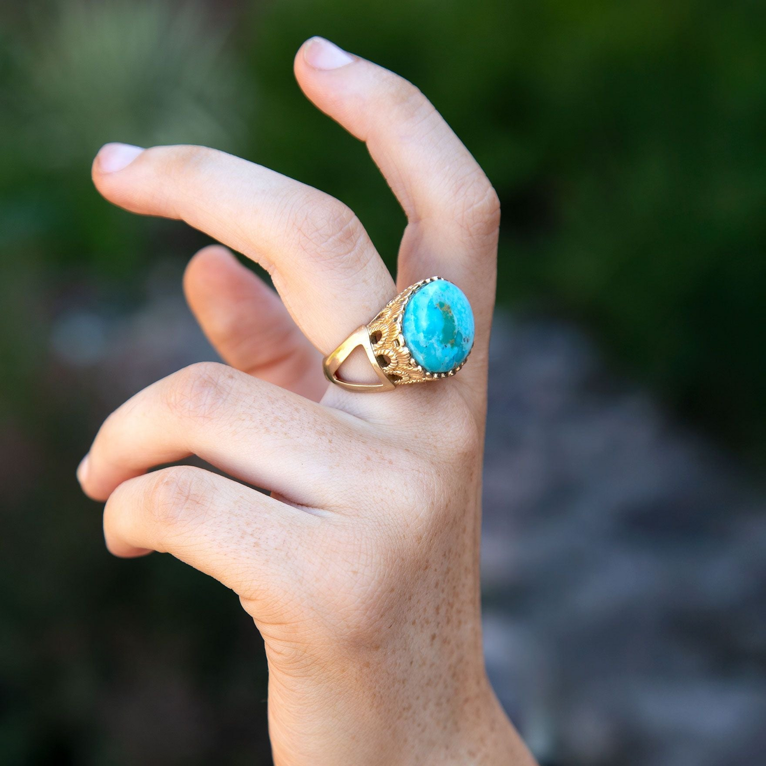 Start2Finish Terra Blue Turquoise Golden Statement Ring featuring a large turquoise stone and intricate gold band design.