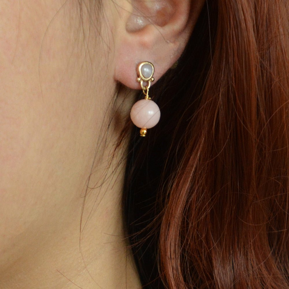 Pink opal drop post earrings with gold accents, featuring elegant teardrop shape and delicate design from Start2Finish.
