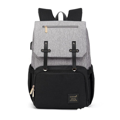 Maroon Asteria high-quality Oxford mummy backpack with multiple compartments, adjustable straps, and a sleek design.