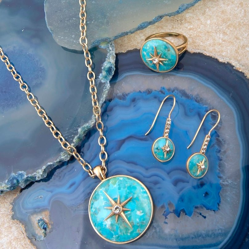 Celestial Blue Turquoise and gold statement ring from Start2Finish jewelry, featuring a bold turquoise centerpiece with intricate gold detailing.