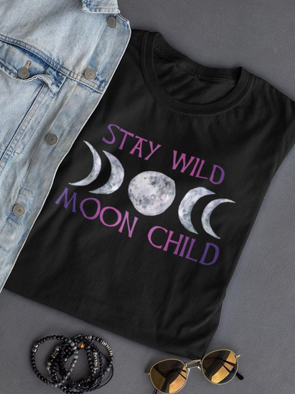 Women’s "Stay Wild, Moon Child" T-shirt by Start2Finish, featuring a celestial moon design on soft, casual apparel.
