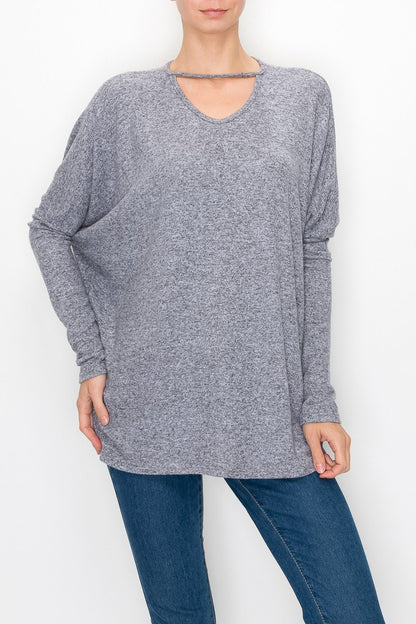 Grey Yellow Hera cutout front long sleeve top featuring a stylish neckline and fitted long sleeves, casual and trendy clothing piece.