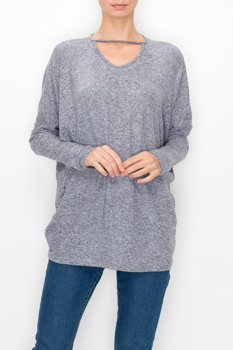 Grey cutout front long sleeve top by Yellow Hera, stylish clothing with a unique neckline and fitted design.