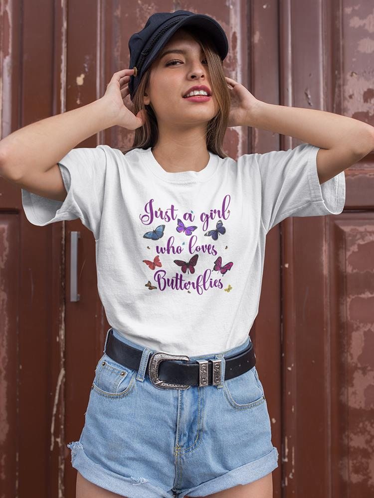 Girl wearing a "A Girl Who Loves Butterflies" T-shirt by Start2Finish, featuring butterfly graphic on a casual apparel shirt.