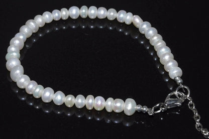 Elegant Silver Hestia cultured freshwater pearls bracelet with a delicate strand of lustrous pearls and a silver clasp.
