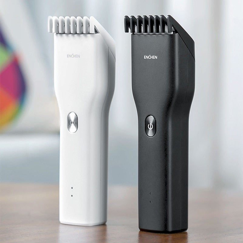 Maroon Asteria cordless hair clipper for adults and children, compact hair shaver with ergonomic design.