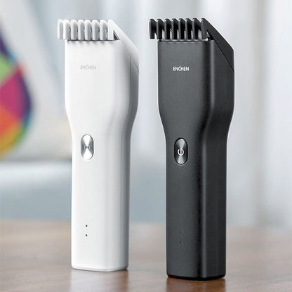 Maroon Asteria cordless hair clipper for adults and children, compact hair shaver with ergonomic design.