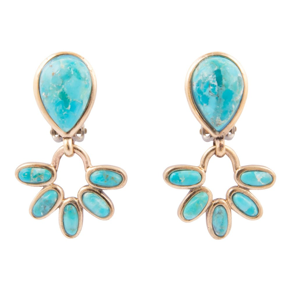 Start2Finish Mojave Blue Turquoise and gold clip earrings featuring vibrant turquoise stones and shiny gold accents.