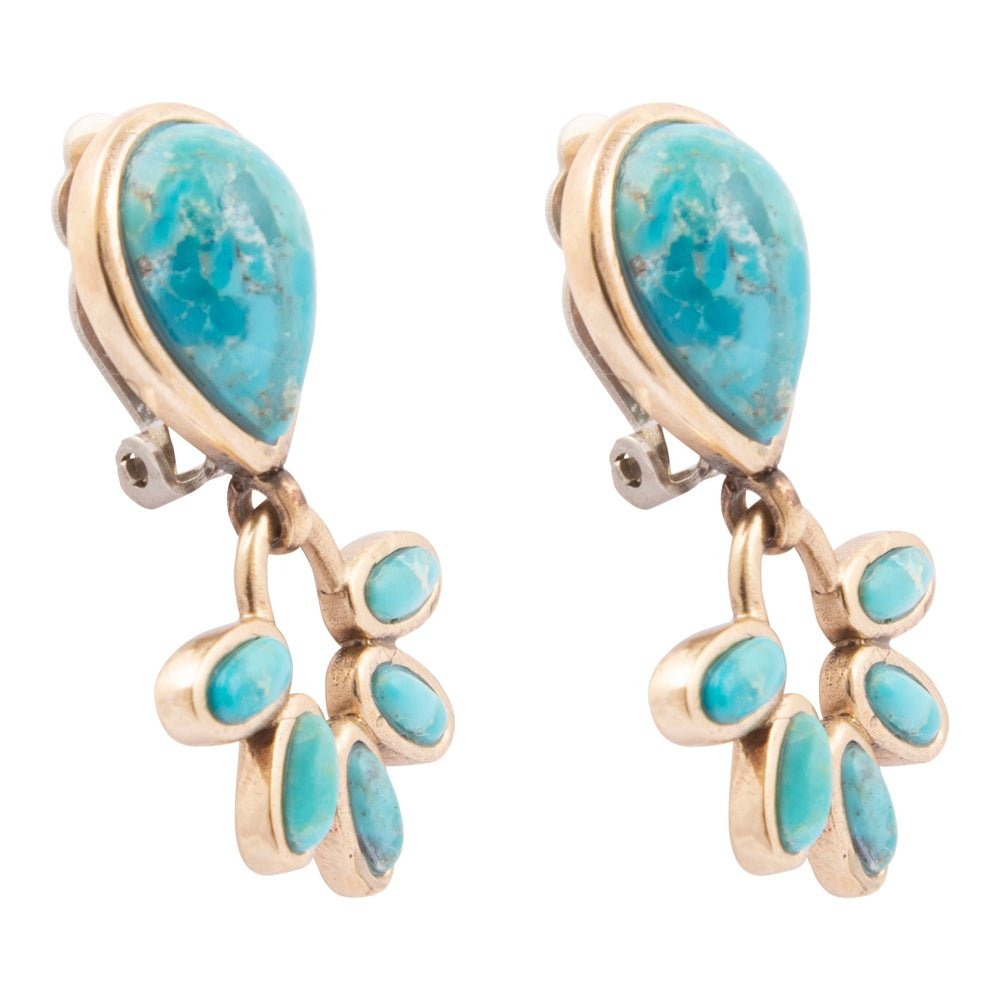 Start2Finish Mojave Blue Turquoise and gold clip earrings with intricate jewelry design and vibrant blue gemstone accents.