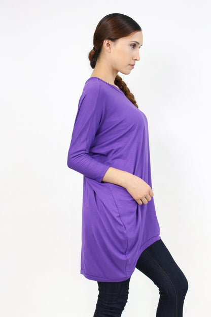 Yellow Hera oversized purple shirt dress with long sleeves and a relaxed fit, displayed on a hanger.