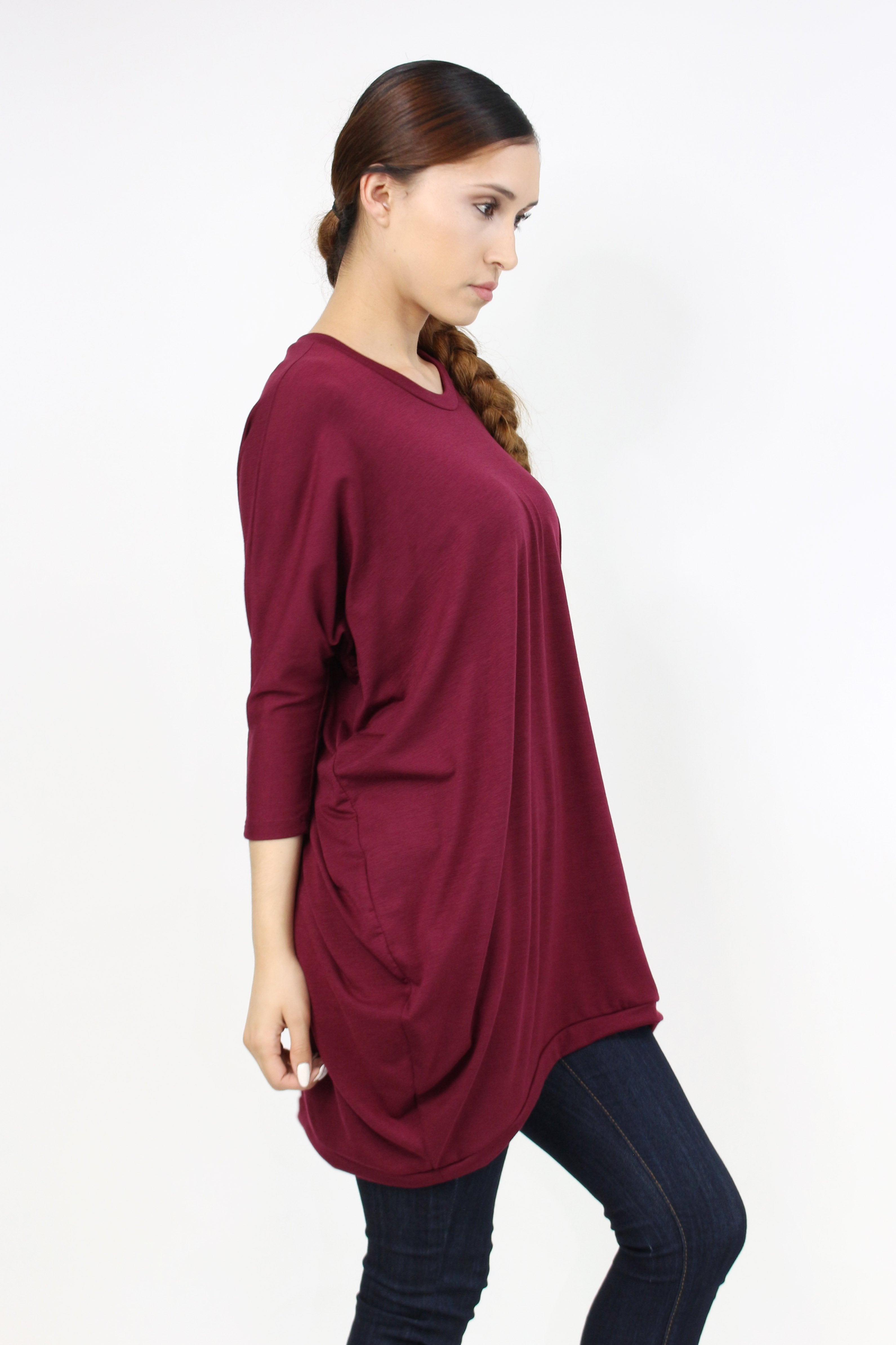 Yellow Hera oversized burgundy shirt dress hanging on a rack, showcasing relaxed fit and stylish casual clothing.