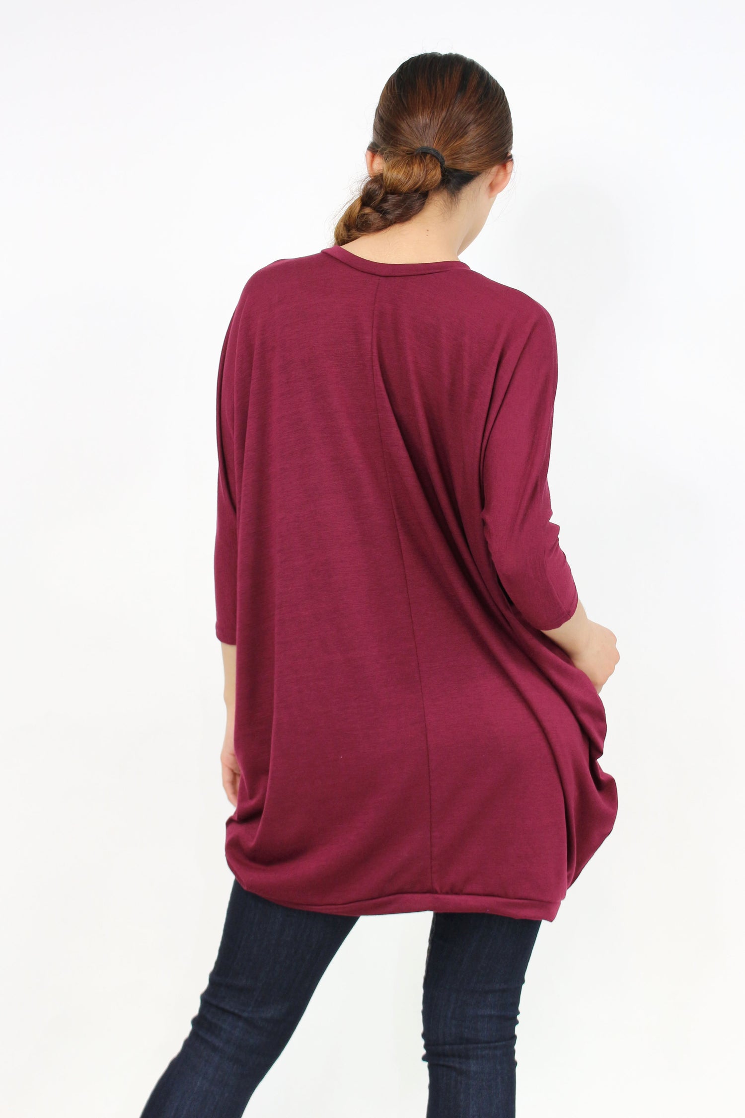 Yellow Hera oversized burgundy shirt dress with long sleeves and a relaxed fit, displayed on a hanger against a plain background.