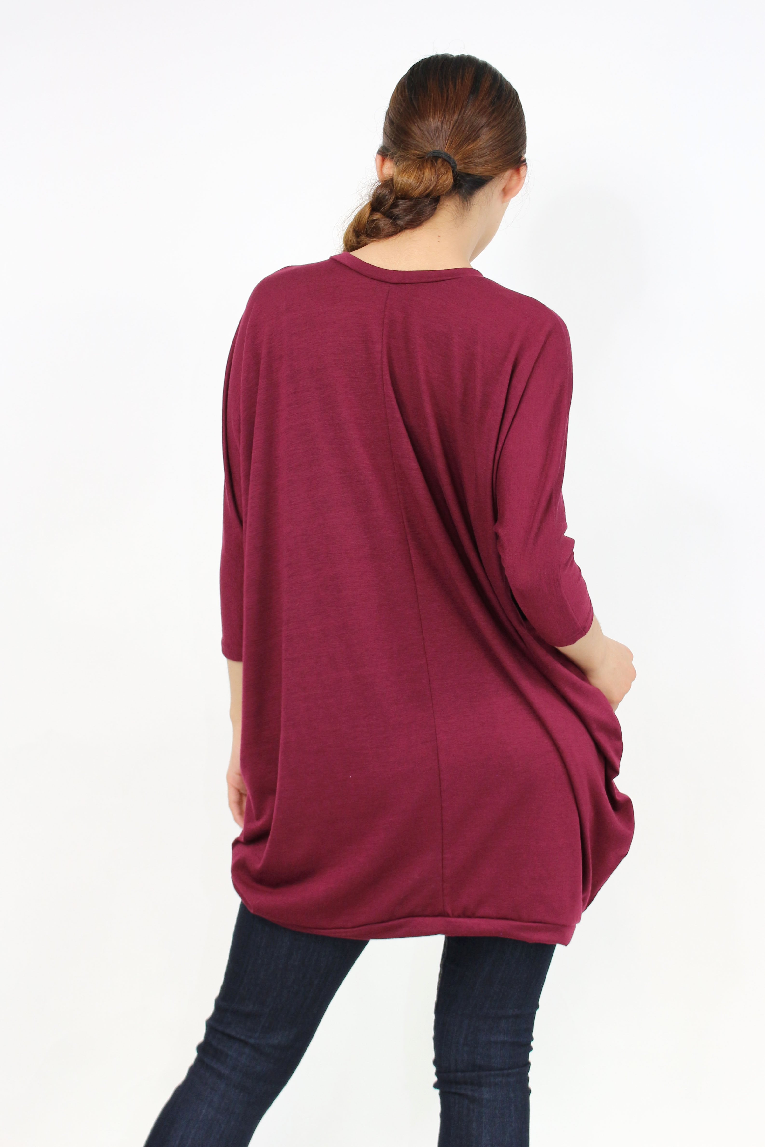 Yellow Hera oversized burgundy shirt dress with long sleeves and a relaxed fit, displayed on a hanger against a plain background.
