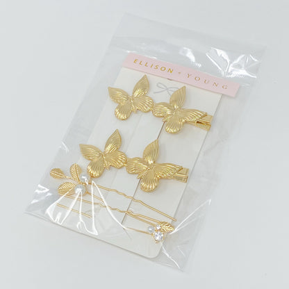 Antique garden-inspired hair clip set by Fuchsia Hercules featuring vintage floral jewelry accessories.