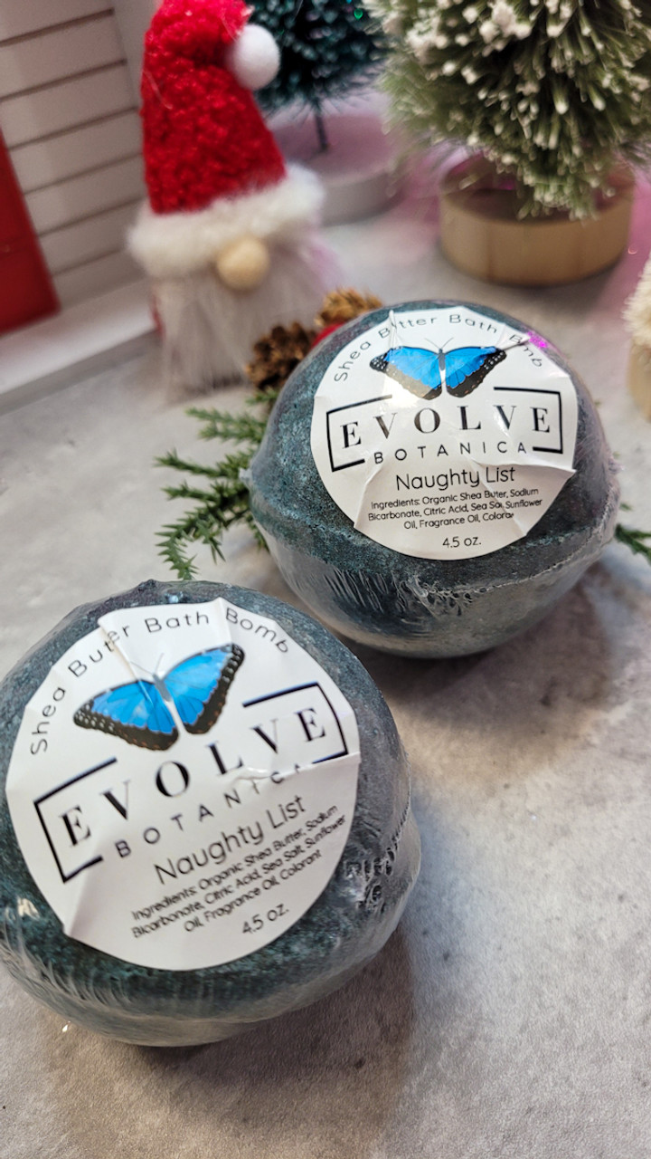 Start2Finish Naughty List bath bomb with colorful swirls and festive packaging for a relaxing bath experience.