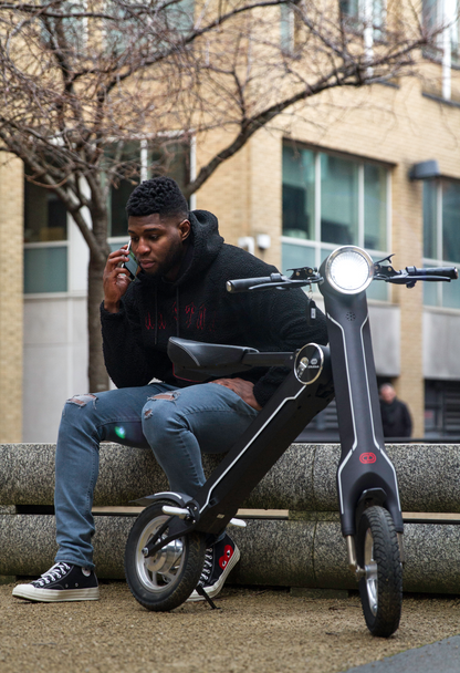 Start2Finish Cruzaa PRO electric scooter in carbon black with built-in Bluetooth, speakers, USB port, 45km range, and 35km/h top speed.