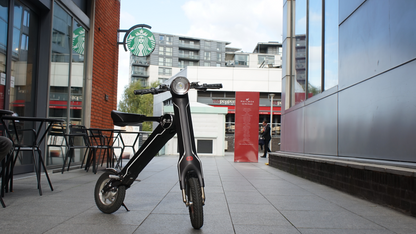 Start2Finish Cruzaa electric scooter in Magno Green with Bluetooth speakers, USB port, 45km range, and 35km/h top speed.