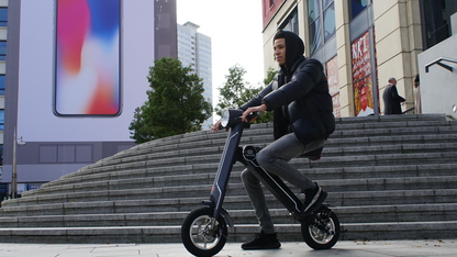 Start2Finish Cruzaa electric scooter in Magno Green with Bluetooth speakers, USB port, 45km range, and 35km/h top speed.