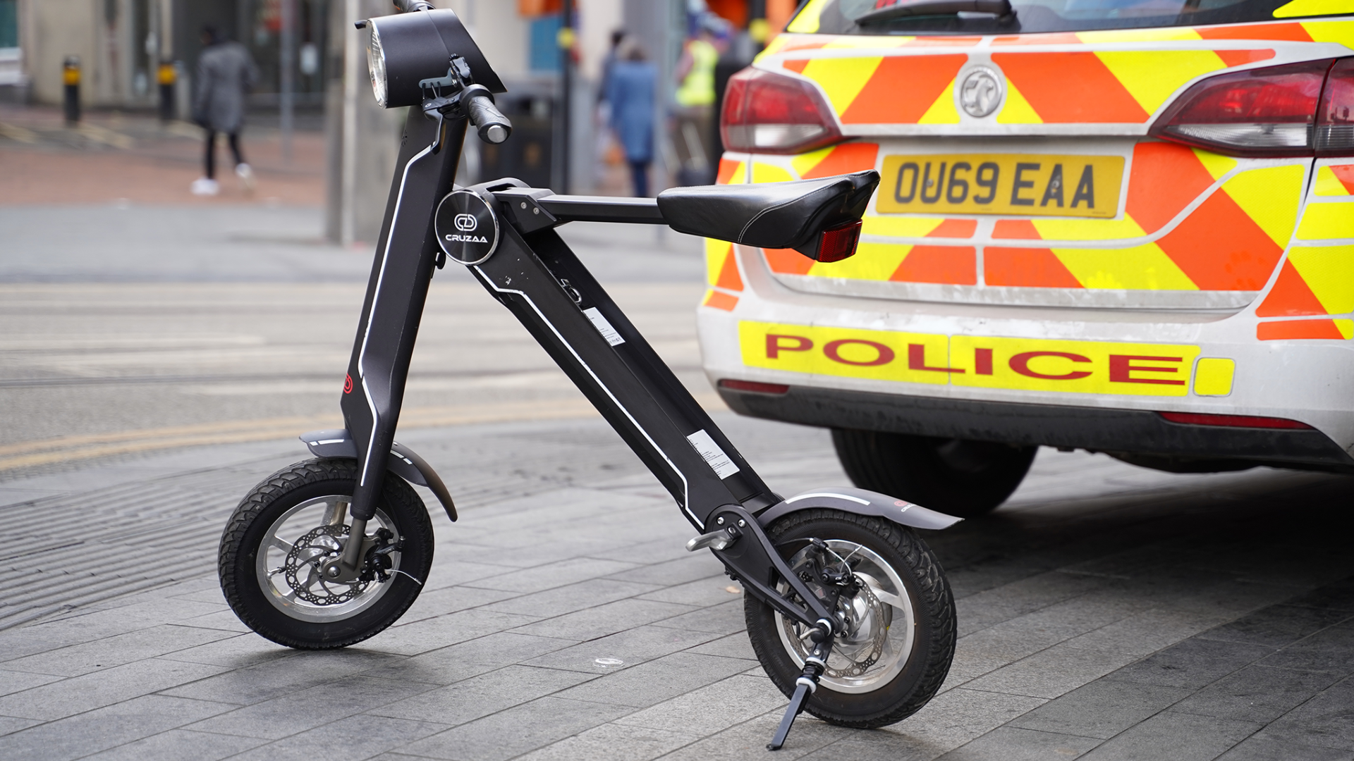 Start2Finish Cruzaa electric scooter in Magno Green with built-in Bluetooth, speakers, USB port, 45km range, and 35km/h top speed.