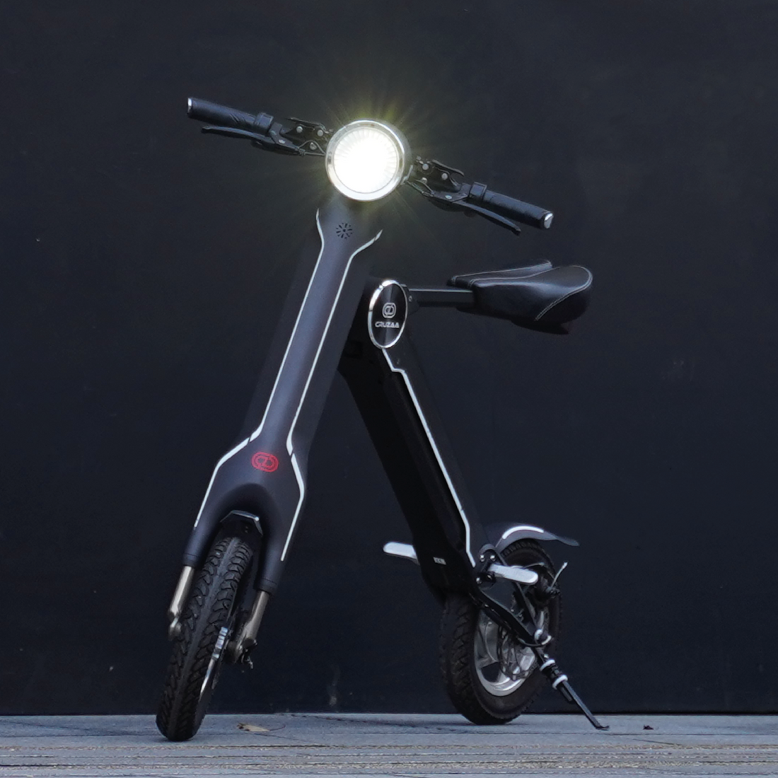 Start2Finish Cruzaa electric scooter with Bluetooth speakers, USB port, sleek design, 35km range, and 25km/h top speed.