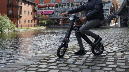 Start2Finish Cruzaa electric scooter with Bluetooth speakers, USB port, 35km range, and 25km/h top speed, shown in image.