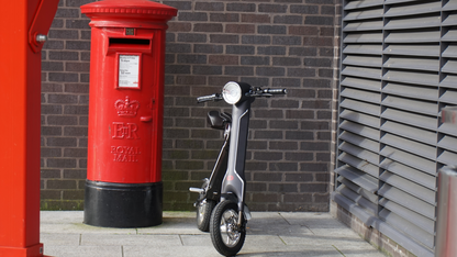 Start2Finish Cruzaa electric scooter with Bluetooth speakers, USB port, 35km range, and 25km/h top speed, shown outdoors.